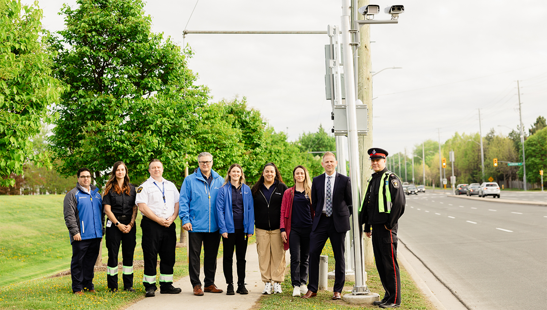 York Region, York Regional Police, York Region Paramedic Services and traffic safety partners standing together beside speed camera