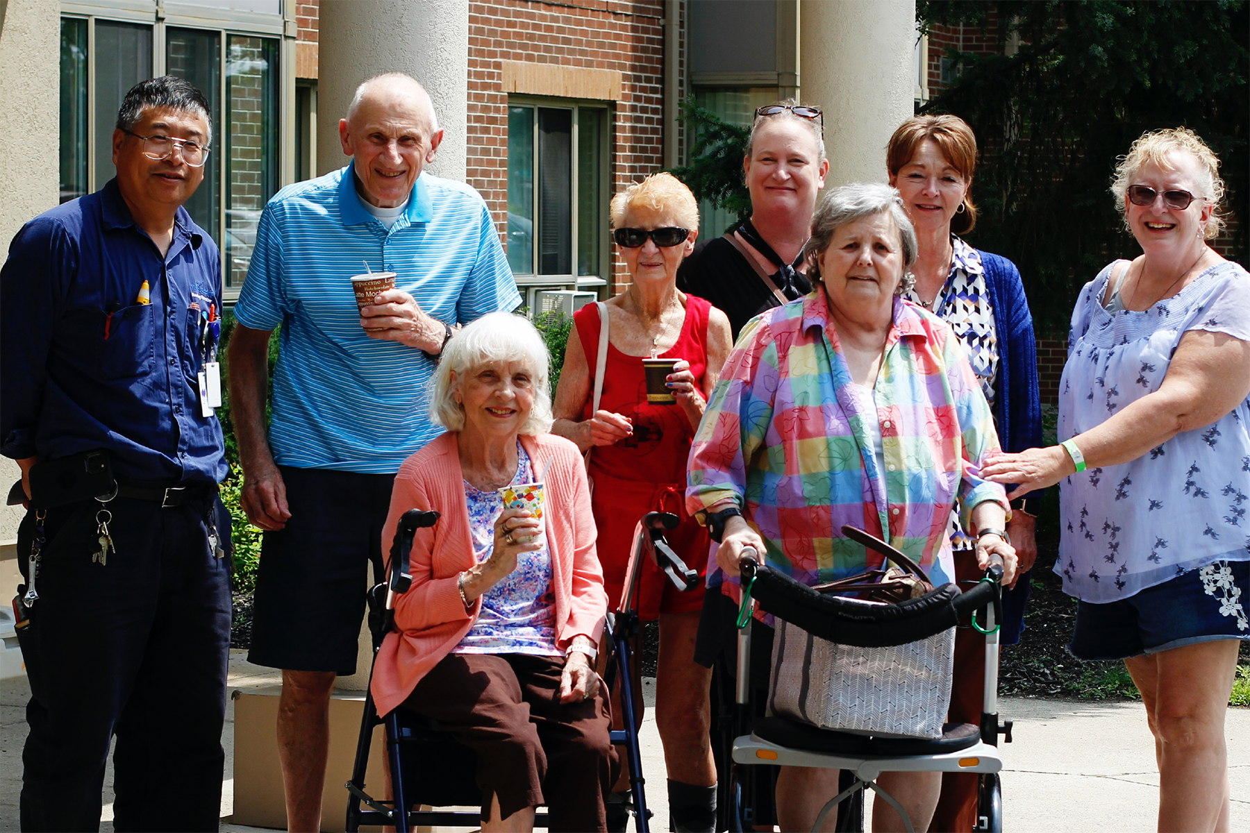 Group of senior's standing outside a building