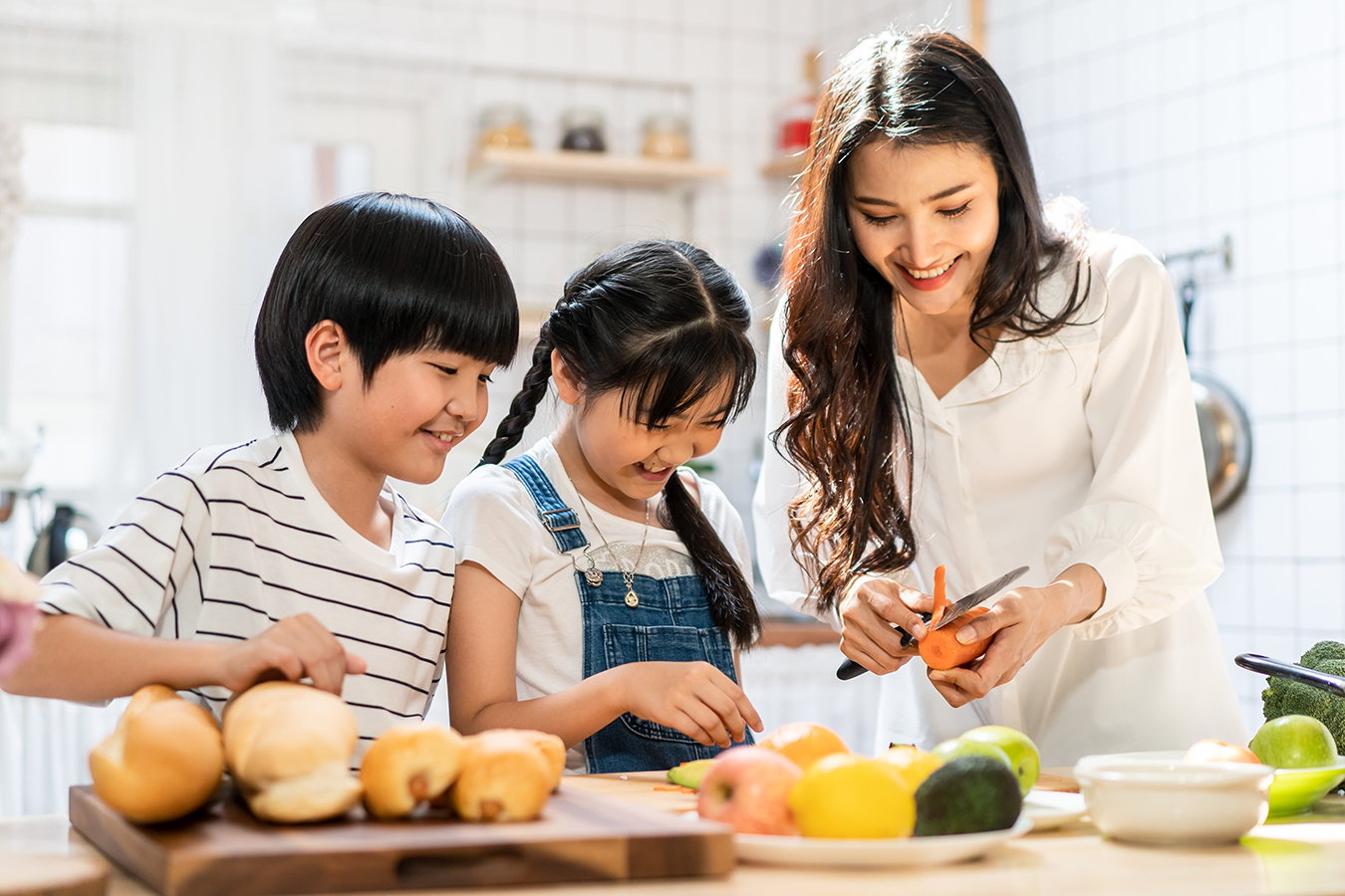 Family making food in kitchen at home