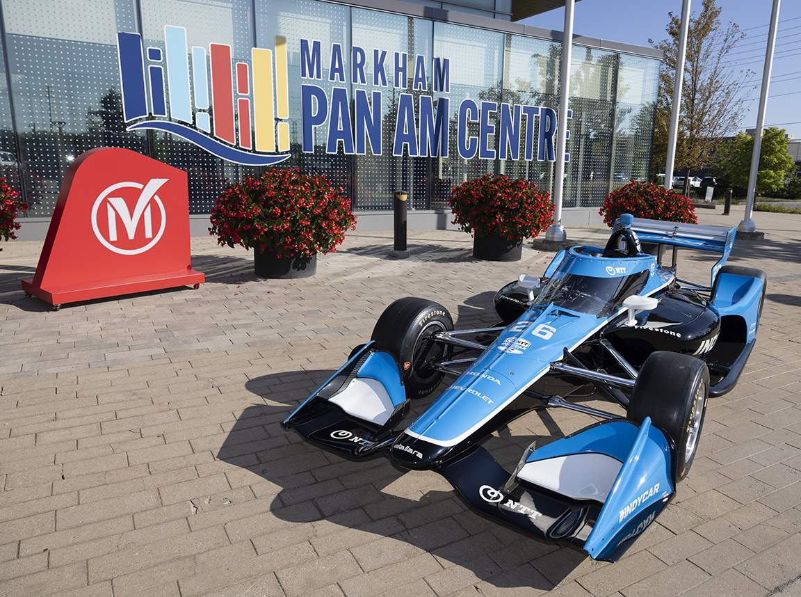 Honda Indy race car parked outside the Markham Pan Am Centre