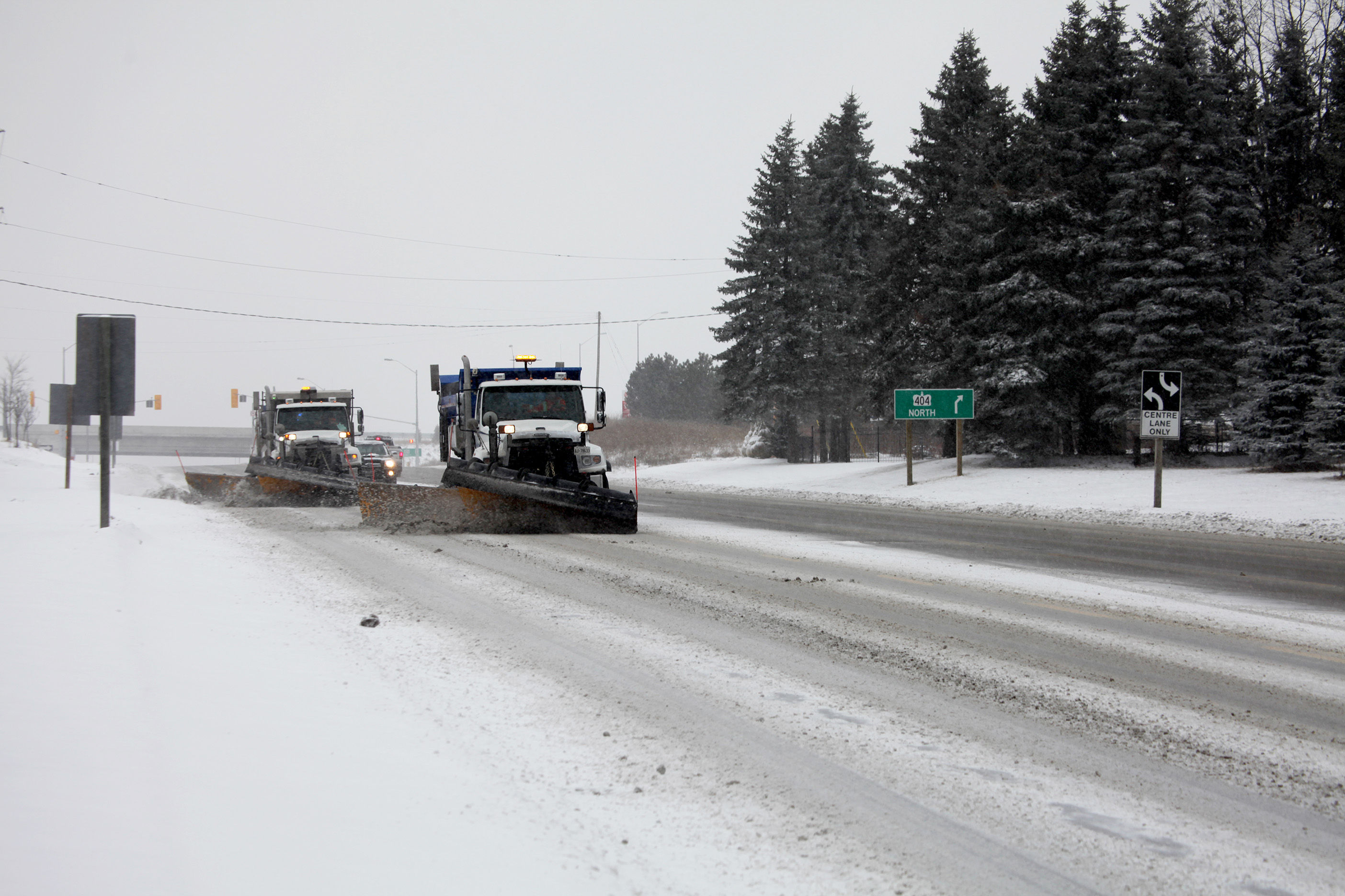 Snow plow on regional road