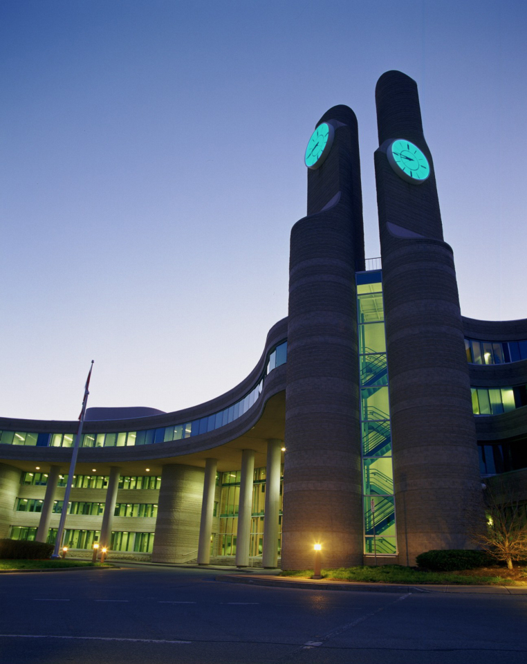 York Region Administrative Building clock towers illuminated in the colour teal