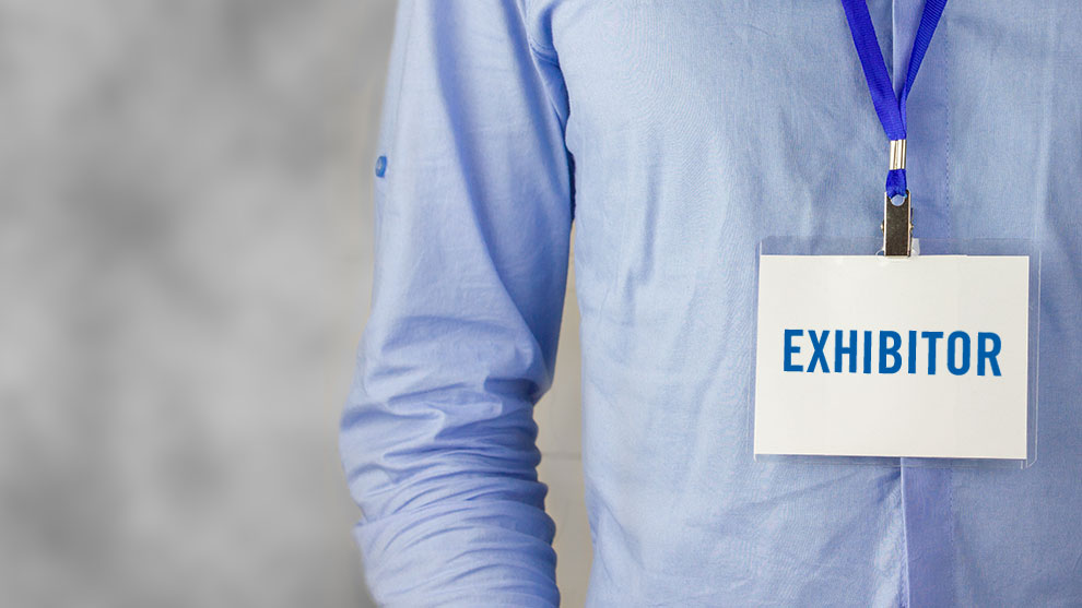 booth hosting fairs and festivals Person wearing an exhibitor pass