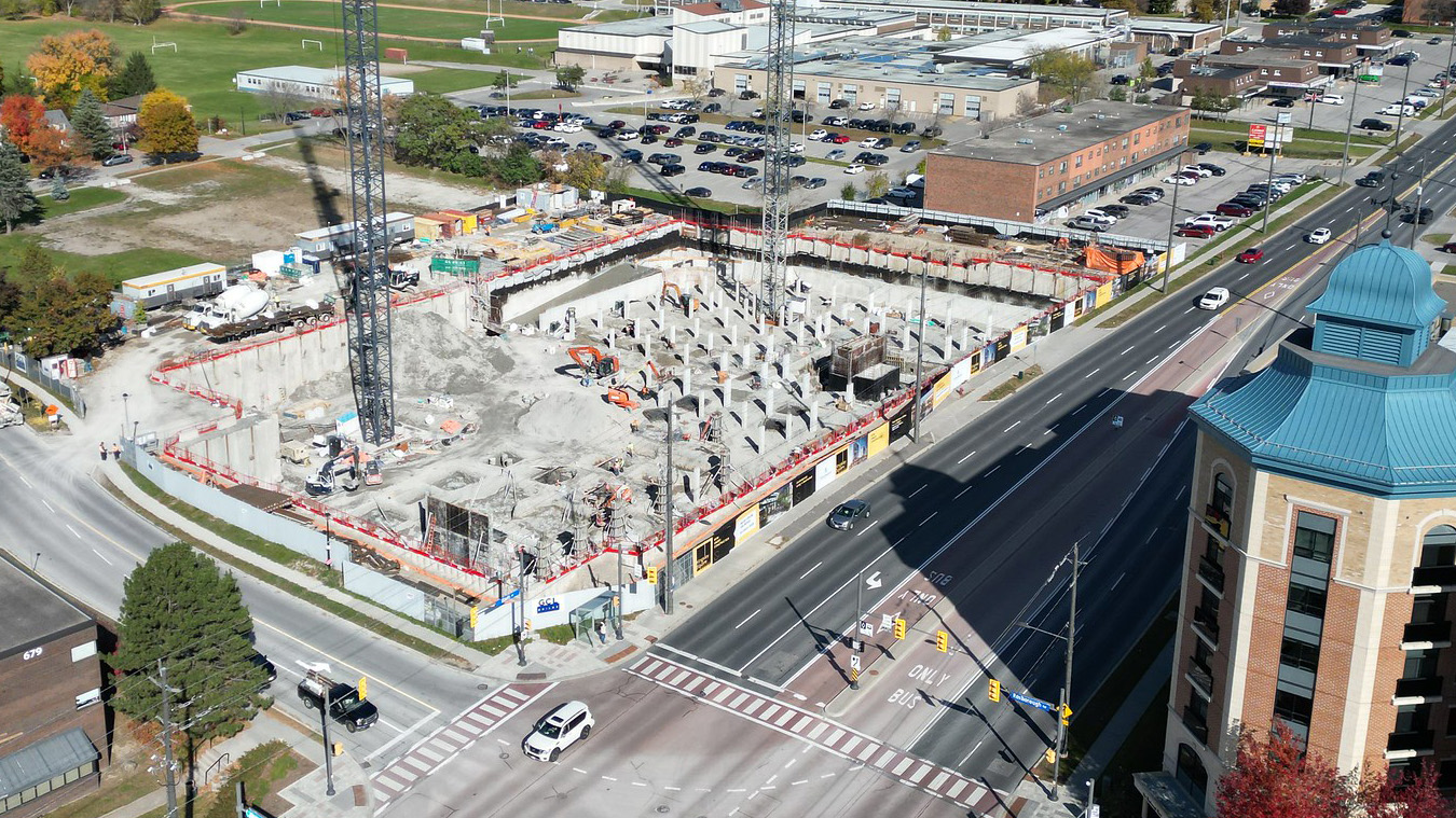 Aerial photograph of property being developed on a main street.