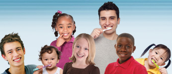 Several children and youths who are smiling or brushing their teeth