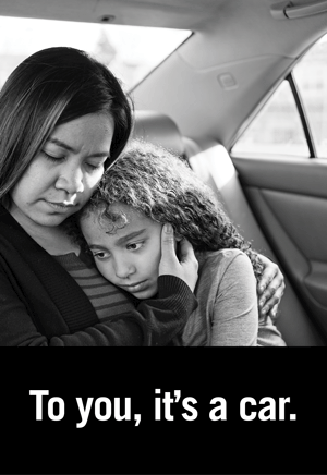 A photo of a woman and child in a car. To you, it's a car. To Olivia and Grace, it's home